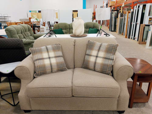 Beige loveseat
