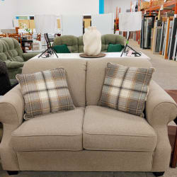 Beige loveseat