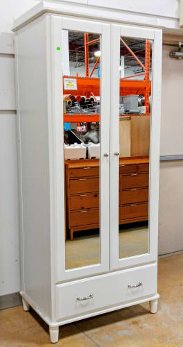 White armoire with glass doors