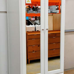 White armoire with glass doors