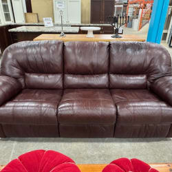 Brown leather couch with recliner