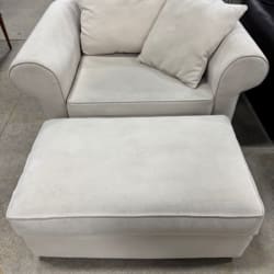 White chair with foot stool