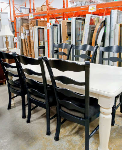 White table dining set with 6 black wooden chairs
